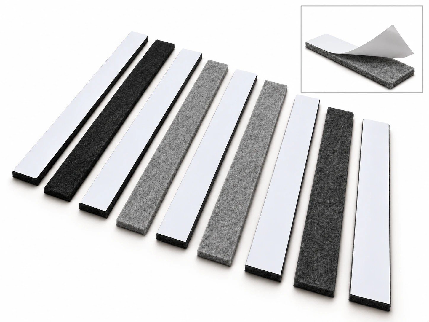 Straight felt strips in black and gray with white release liners and a liner peel detail